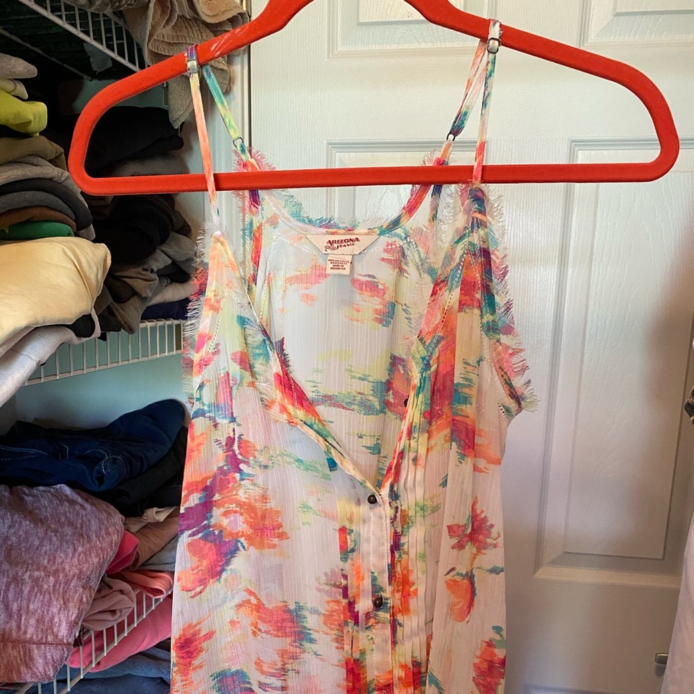 Women’s sheer tank top buttons all the way down